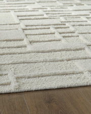 Empriss Ivory 7'8" x 10' Area Rug - R407621