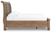 Feddinger King Storage Sleigh Bed with Mirrored Dresser and Chest in Medium Brown - PKG022336