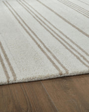 Gadence Ivory/Tan 7'8" x 10' Area Rug - R407641