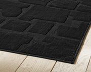 Gibbswell Black Washable 5' x 7' Area Rug - R407462