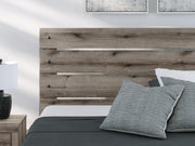Graystorm King Panel Bed, Dresser and Nightstand in Brown Gray - PKG021362