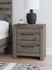 Graystorm Queen Panel Bed, Dresser, Mirror, Chest and 2 Nightstands in Brown Gray - PKG021349