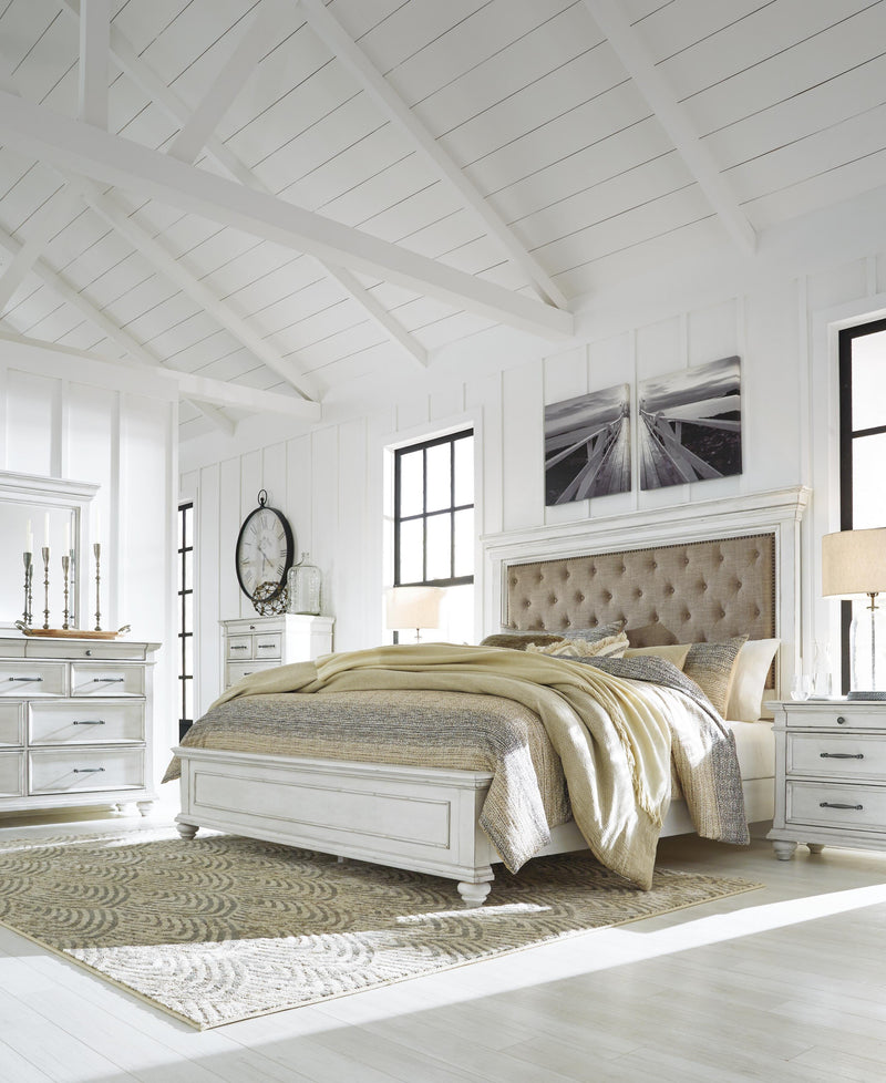 Kanwyn Whitewash Cal King Upholstered Panel Bed, Dresser, Mirror and Chest - B777B23