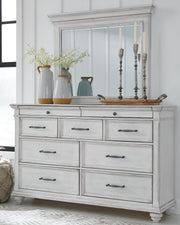 Kanwyn Whitewash King Upholstered Panel Bed, Dresser, Mirror and Chest - B777B18