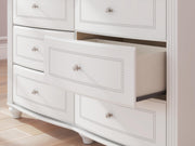 Kozlani Full Upholstered Panel Bed, Dresser and Chest in White - PKG023804