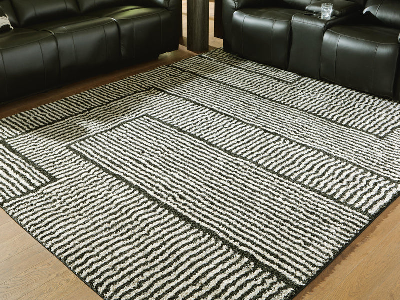 Kurtmen Black/Ivory 7'10" x 9'10" Area Rug - R407591