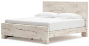 Lawroy King Panel Bed with Storage, Dresser, Mirror and Chest in Light Natural - PKG020189