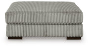 Lindyn Fog 4-Piece Sectional and Ottoman - 21105U7