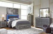Lodanna Queen Panel Bed with 2 Storage Drawers with Mirrored Dresser and Chest in Gray - PKG003585
