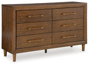 Lyncott California King Upholstered Bed with Dresser and 2 Nightstands in Brown from Ashley - DMV Furniture