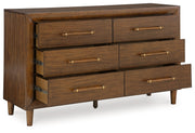 Lyncott California King Upholstered Bed with Dresser and 2 Nightstands in Brown from Ashley - DMV Furniture