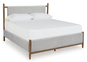 Lyncott California King Upholstered Bed with Mirrored Dresser, Chest and Nightstand in Brown from Ashley - DMV Furniture