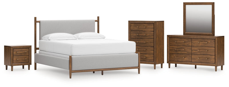 Lyncott California King Upholstered Bed with Mirrored Dresser, Chest and Nightstand in Brown from Ashley - DMV Furniture