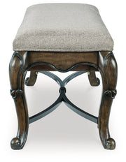 Maylee Dining Table and 4 Chairs and Bench with Storage in Dark Brown from Ashley - DMV Furniture