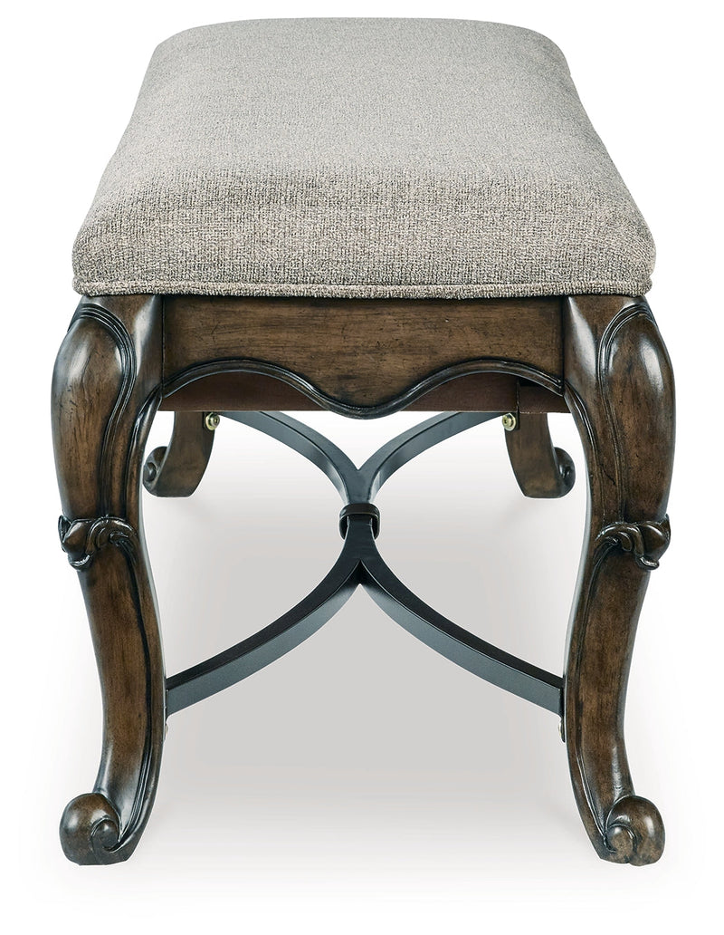 Maylee Dining Table and 4 Chairs and Bench with Storage in Dark Brown from Ashley - DMV Furniture
