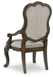 Maylee Dining Table and 6 Chairs with Storage in Dark Brown from Ashley - DMV Furniture