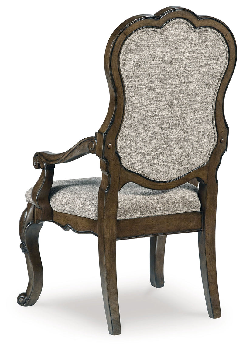 Maylee Dining Table and 8 Chairs with Storage in Dark Brown from Ashley - DMV Furniture