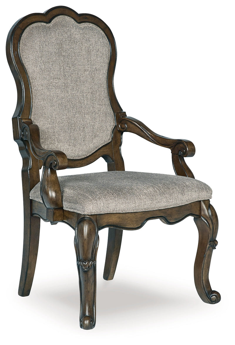 Maylee Dining Table and 8 Chairs with Storage in Dark Brown from Ashley - DMV Furniture