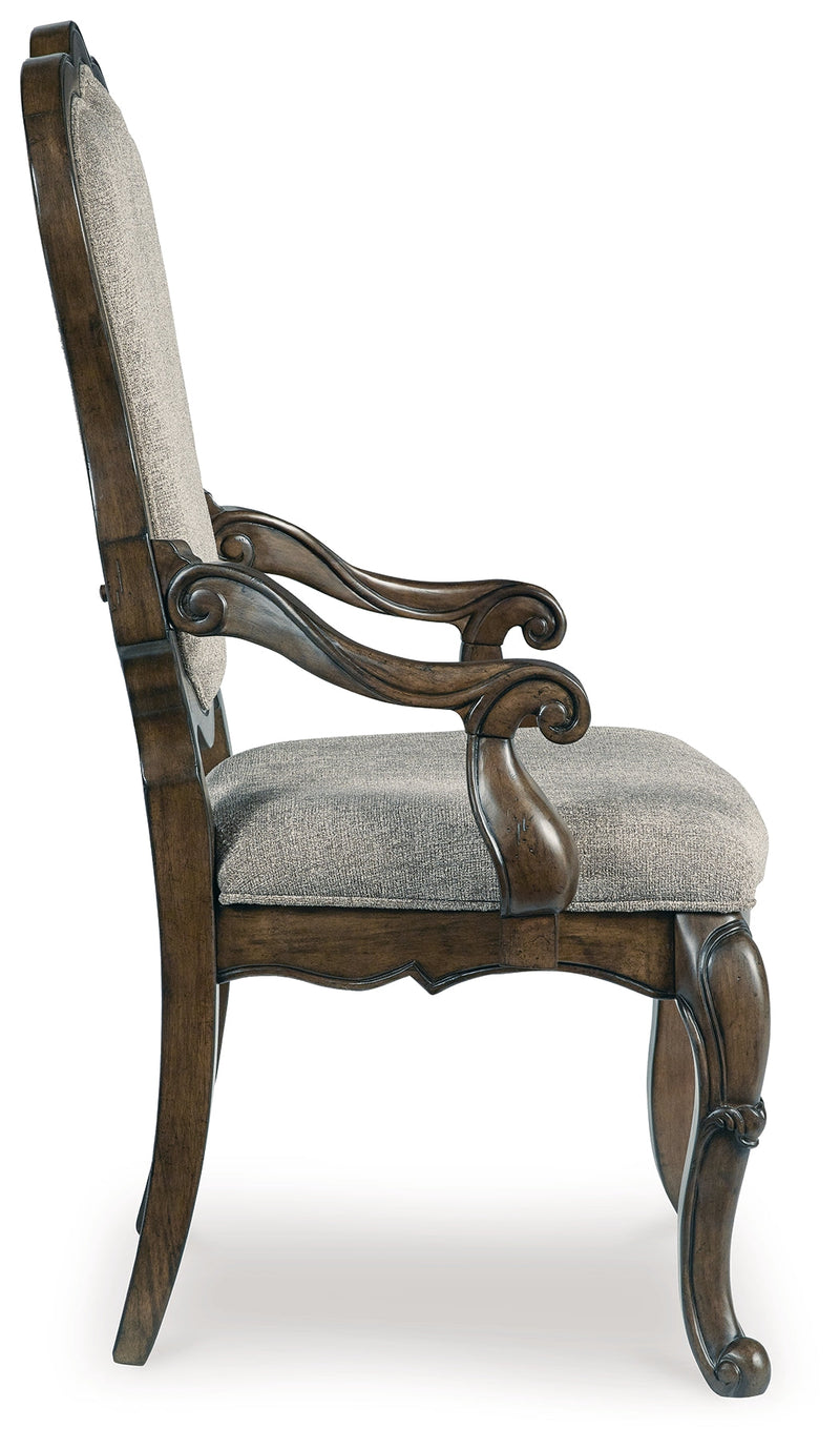 Maylee Dining Table and 8 Chairs with Storage in Dark Brown from Ashley - DMV Furniture