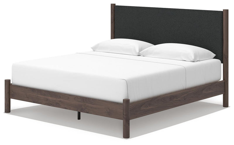 Pamytta King Upholstered Panel Platform Bed, Chest and  Nightstand in Brown - PKG022782