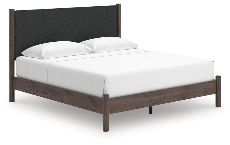 Pamytta King Upholstered Panel Platform Bed, Dresser, Mirror and Chest in Brown - PKG022749