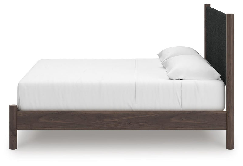 Pamytta King Upholstered Panel Platform Bed, Dresser, Mirror and Chest in Brown - PKG022749