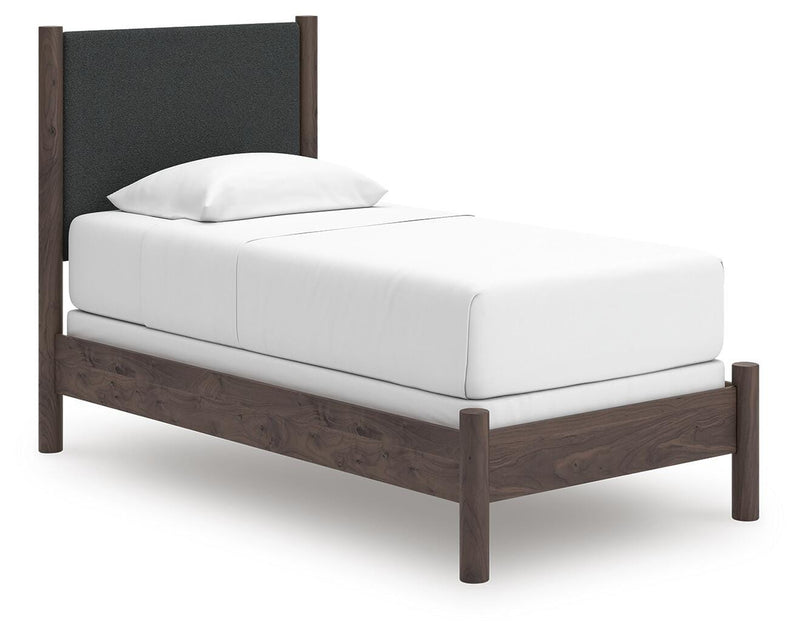 Pamytta Twin Upholstered Panel Bed, Dresser and Nightstand in Brown - PKG022722