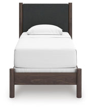 Pamytta Twin Upholstered Panel Bed, Dresser, Mirror and Nightstand in Brown - PKG022718