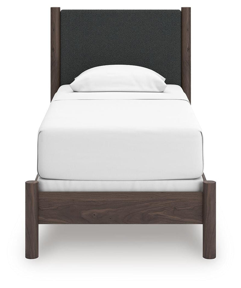 Pamytta Twin Upholstered Panel Bed, Dresser, Mirror, Chest and Nightstand in Brown - PKG022720