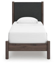 Pamytta Twin Upholstered Panel Platform Bed and Dresser in Brown - PKG022685