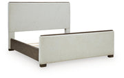 Radkin Burnished Brown King Upholstered Panel Bed - PCB843B4