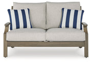 Rainier Ranch Outdoor Loveseat and 2 Chairs with Coffee Table in Brown/Beige from Ashley - DMV Furniture