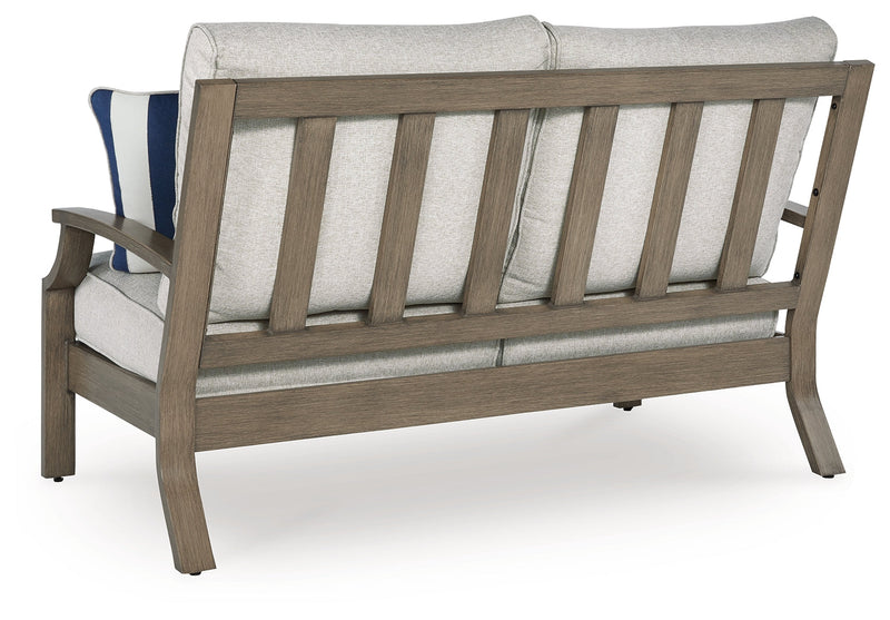 Rainier Ranch Outdoor Loveseat and 2 Chairs with Coffee Table in Brown/Beige from Ashley - DMV Furniture