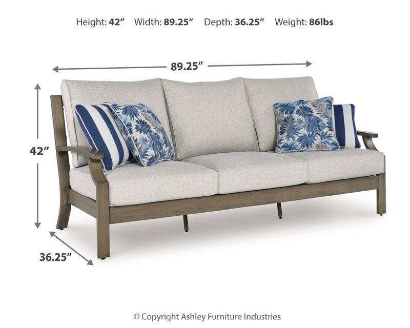 Rainier Ranch Outdoor Sofa and 2 Chairs with Coffee Table in Brown/Beige from Ashley - DMV Furniture