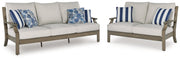 Rainier Ranch Outdoor Sofa and Loveseat in Brown/Beige from Ashley - DMV Furniture