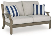 Rainier Ranch Outdoor Sofa and Loveseat in Brown/Beige from Ashley - DMV Furniture