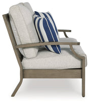 Rainier Ranch Outdoor Sofa and Loveseat in Brown/Beige from Ashley - DMV Furniture