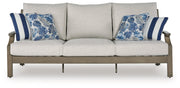 Rainier Ranch Outdoor Sofa and Loveseat in Brown/Beige from Ashley - DMV Furniture