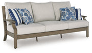 Rainier Ranch Outdoor Sofa and Loveseat in Brown/Beige from Ashley - DMV Furniture