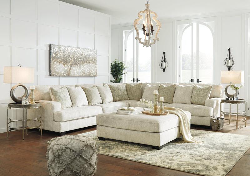Rawcliffe 3-Piece Sectional with Ottoman in Parchment from Ashley - DMV Furniture