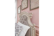 Realyn Chipped White Queen Upholstered Panel Bed - DMV FurnitureQueen Bed