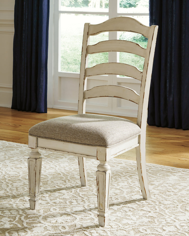Realyn Chipped White 7-piece Oval/Round Dining Table Set from Ashley - DMV Furniture