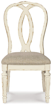 Realyn Chipped White Dining Table and 8 Ribbon Back Chairs from Ashley - DMV Furniture