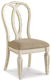 Realyn Chipped White Dining Table and 8 Ribbon Back Chairs from Ashley - DMV Furniture