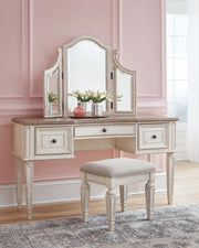 Realyn Two-tone King Panel Bed, Dresser, Mirror, Chest, Vanity and Nightstand - B743B58