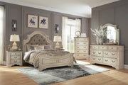 Realyn Two-tone Queen Upholstered Panel Bed and 2 Nightstands - B743B55