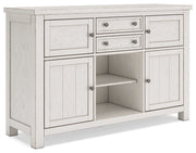 Robbinsdale Antique White Counter Height Dining Table and 8 Barstools with Storage from Ashley - DMV Furniture