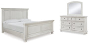 Robbinsdale Queen Panel Bed with Mirrored Dresser in Antique White from Ashley - DMV Furniture