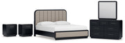 Rowanbeck California King Upholstered Panel Bed with Mirrored Dresser and 2 Nightstands in Gray/Black from Ashley - DMV Furniture