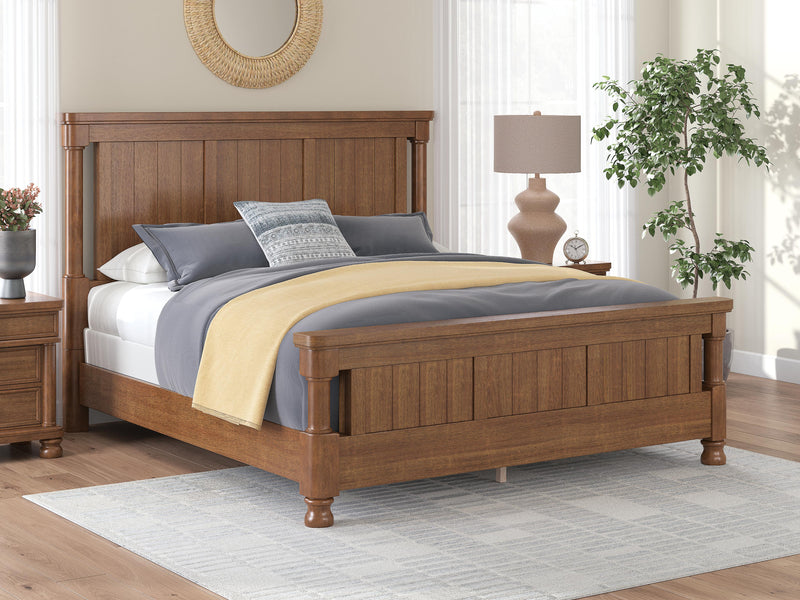 Rowlenstown California King Poster Bed with Dresser and Chest in Brown - PKG023769